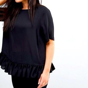 Woven blouse with ruffle hem